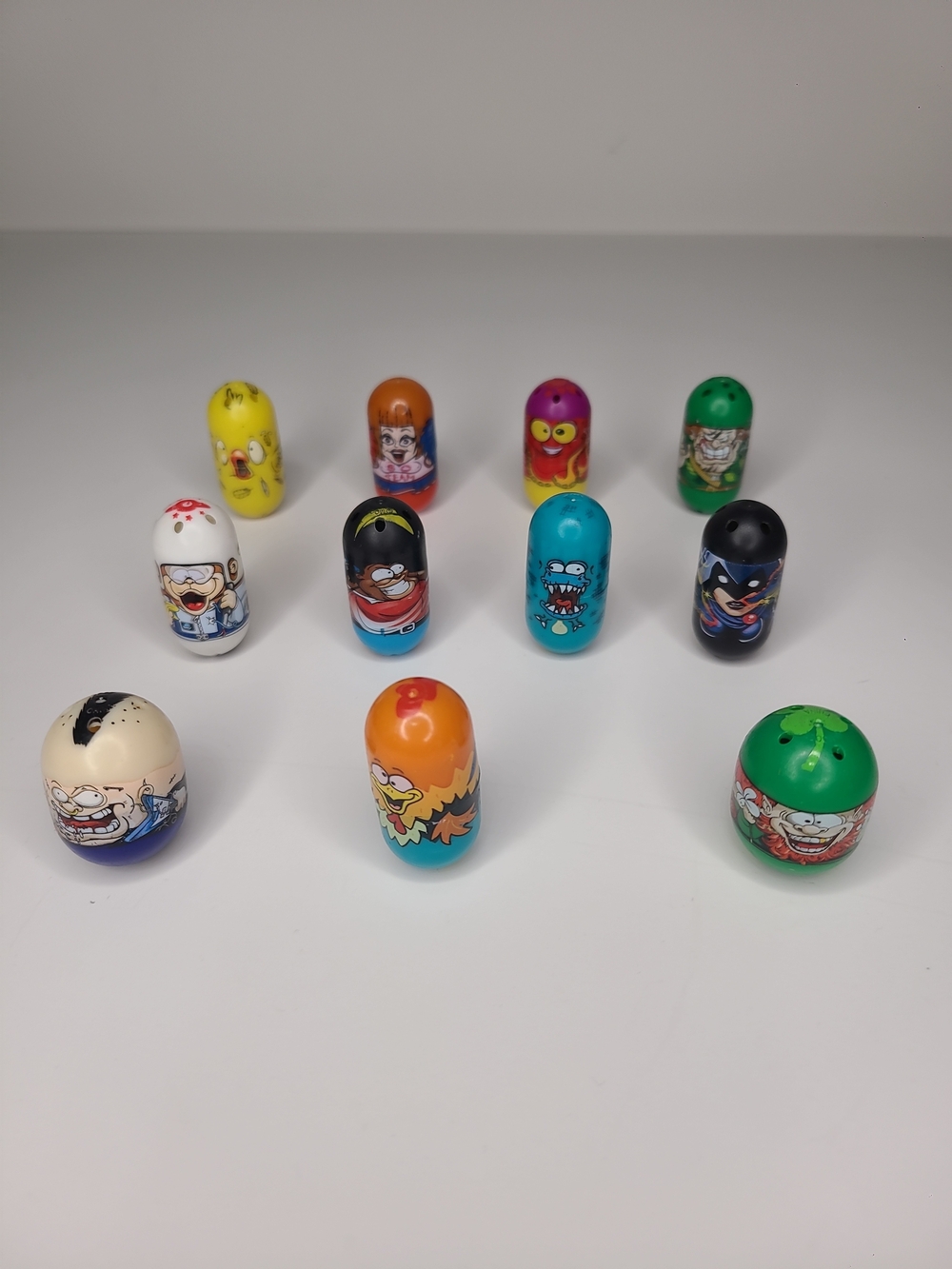 Mighty Beanz Lot of 11 Figures Leprechaun Rooster Punk Raven Golfer Space Monkey